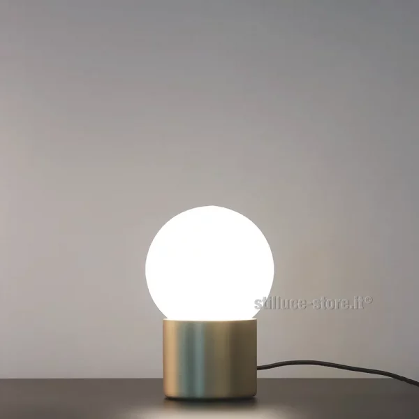 MARTINELLI-PULCE-TAVOLO-ORO-ACCESA-LAMPADA-KMZERO-STILLUCE-STORE-BERGAMO